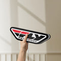 Unlit Fly Racing LED lightbox held by hand to show size and details