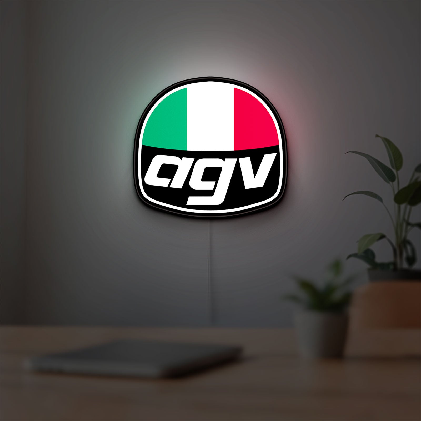 AGV Racing LED lightbox hanging on a room wall with soft white light