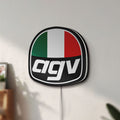 Unlit AGV Racing LED lightbox mounted on a wall in daylight