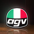 Front view of AGV Racing LED lightbox sign glowing on a wooden desk
