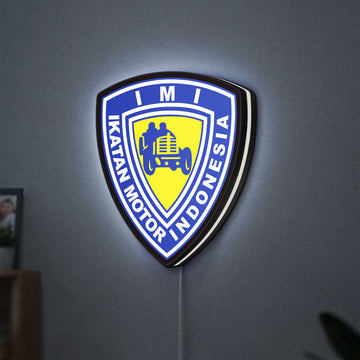 Ikatan Motor Indonesia LED lightbox hanging on a wall with white glow