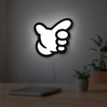 No Good Racing LED lightbox hanging on a room wall with soft white light