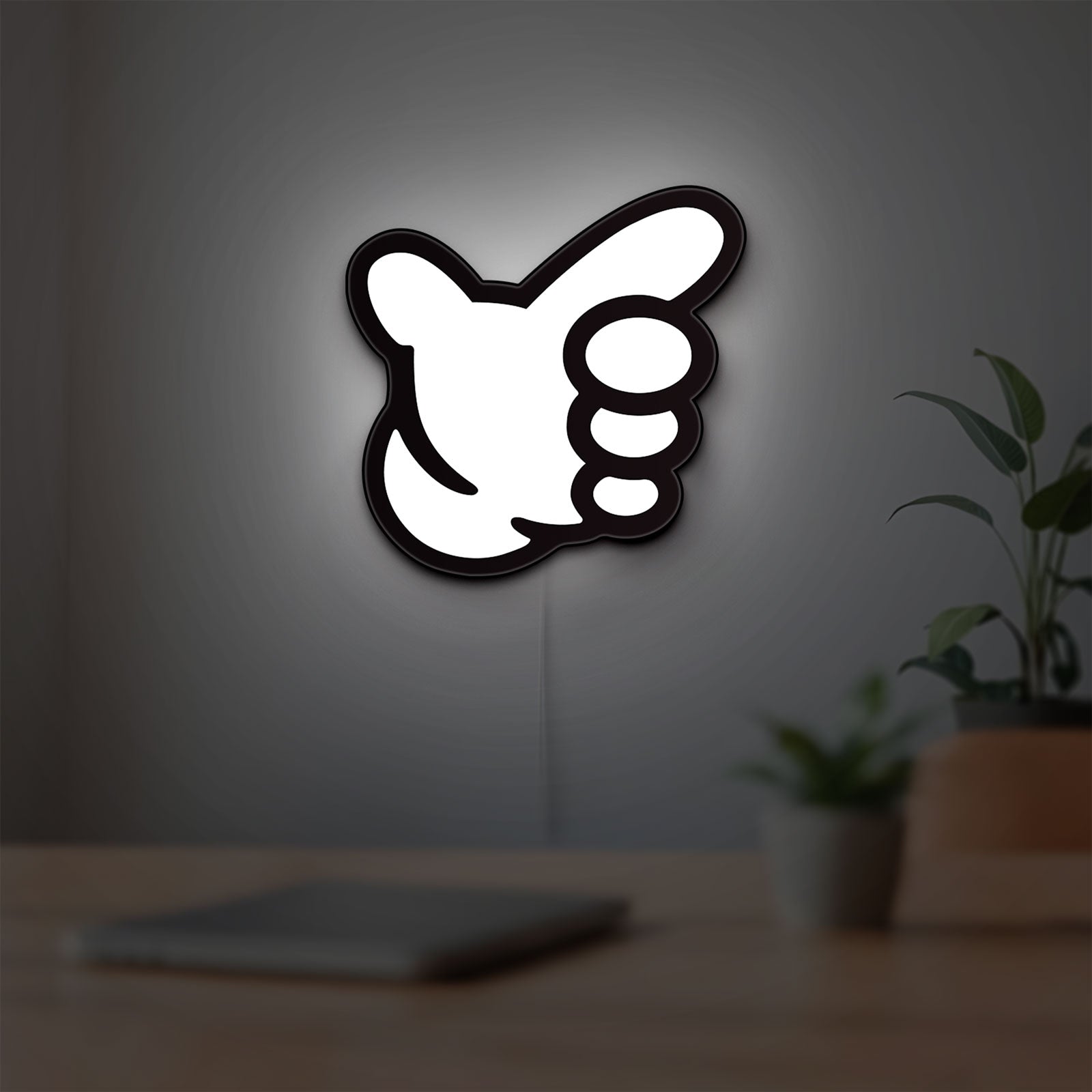 No Good Racing LED lightbox hanging on a room wall with soft white light