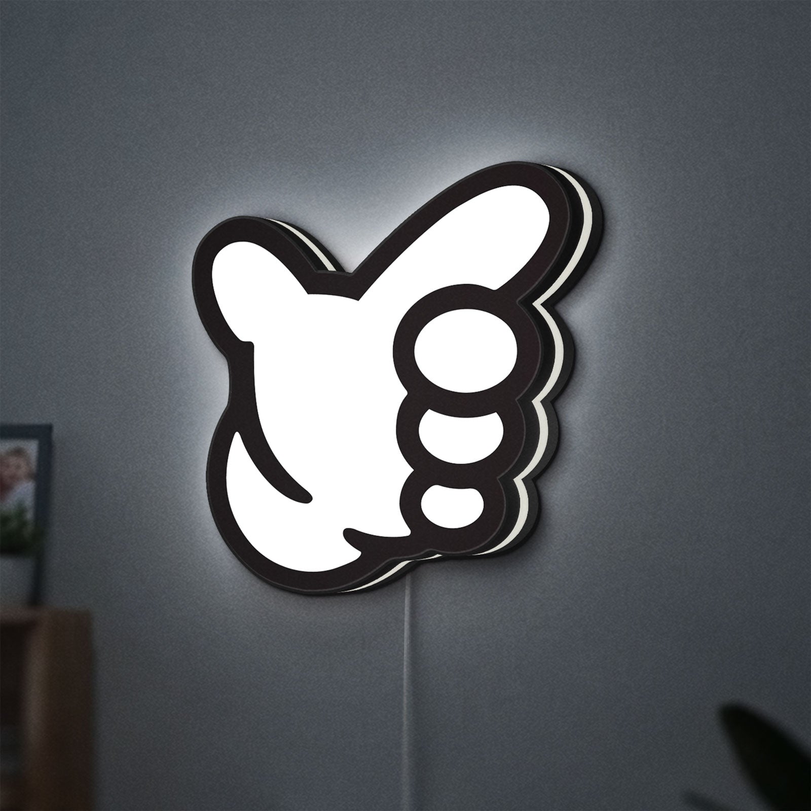 No Good Racing LED lightbox hanging on a wall with white glow