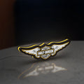 Harley Davidson Wings LED lightbox standing on a desk from an angled side view with yellow glow