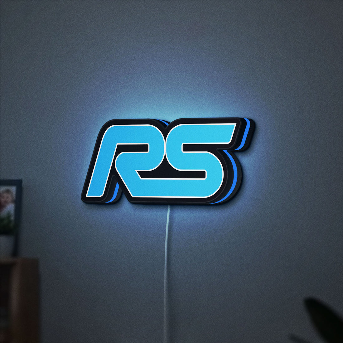 Ford Focus RS LED lightbox hanging on a wall with blue glow