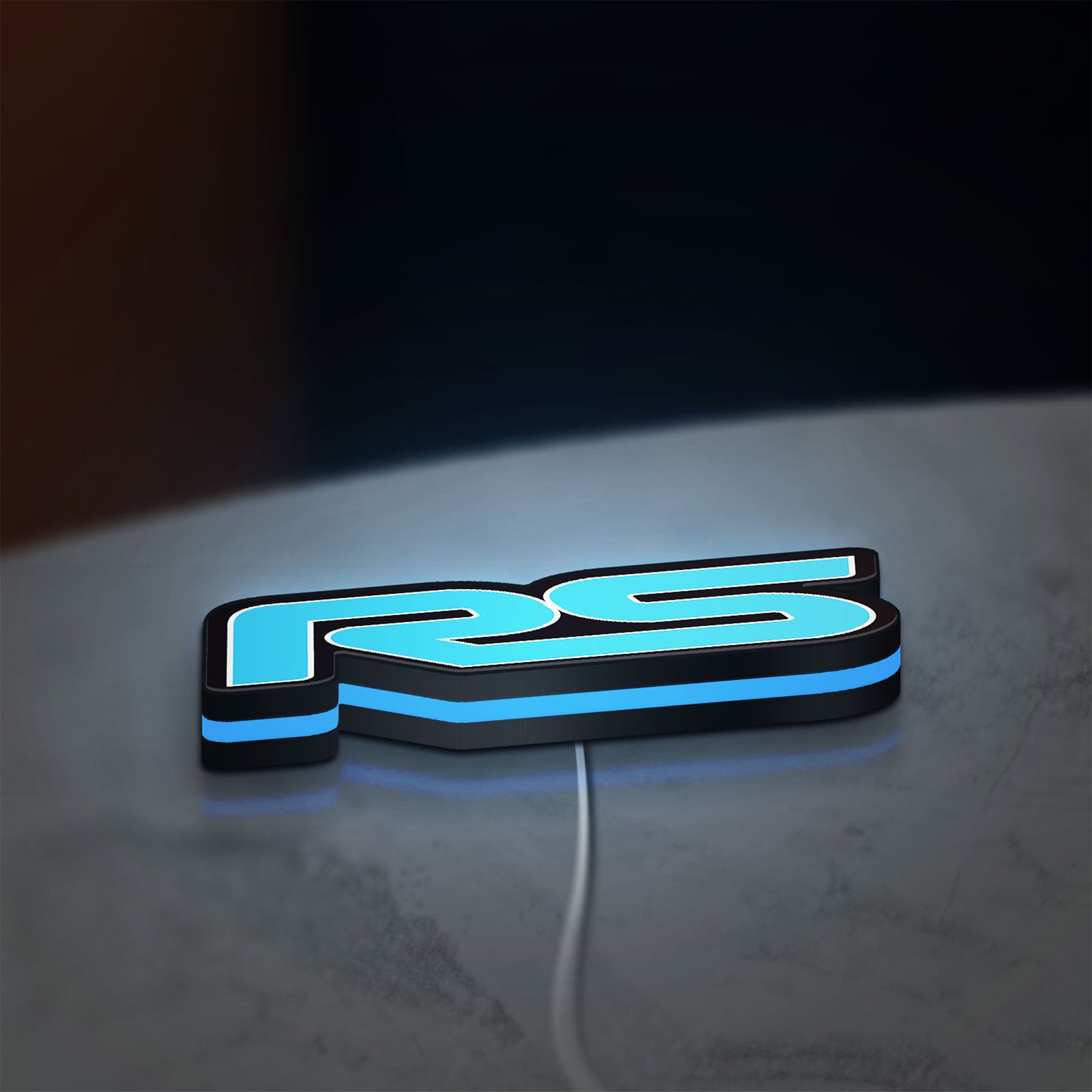 Ford Focus RS LED lightbox lying flat on a desk with blue glow