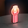 Kenworth LED lightbox standing on a desk from an angled side view with red glow