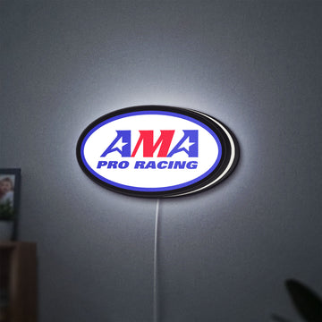 AMA Pro Racing LED lightbox hanging on a wall with white glow