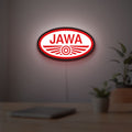 Jawa Motorcycle LED lightbox hanging on a room wall with soft red light