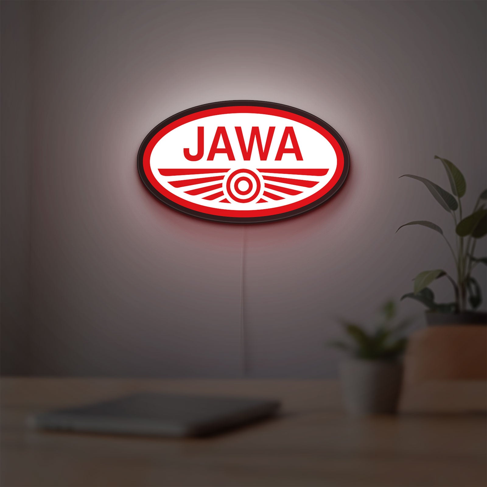 Jawa Motorcycle LED lightbox hanging on a room wall with soft red light