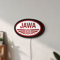 Unlit Jawa Motorcycle LED lightbox mounted on a wall in daylight