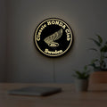Classic Honda Racing Club LED lightbox hanging on a room wall with soft yellow light