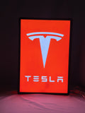 Illuminated front view standing of Tesla Illuminated Sign in 40cm, perfect for garage and man cave decor