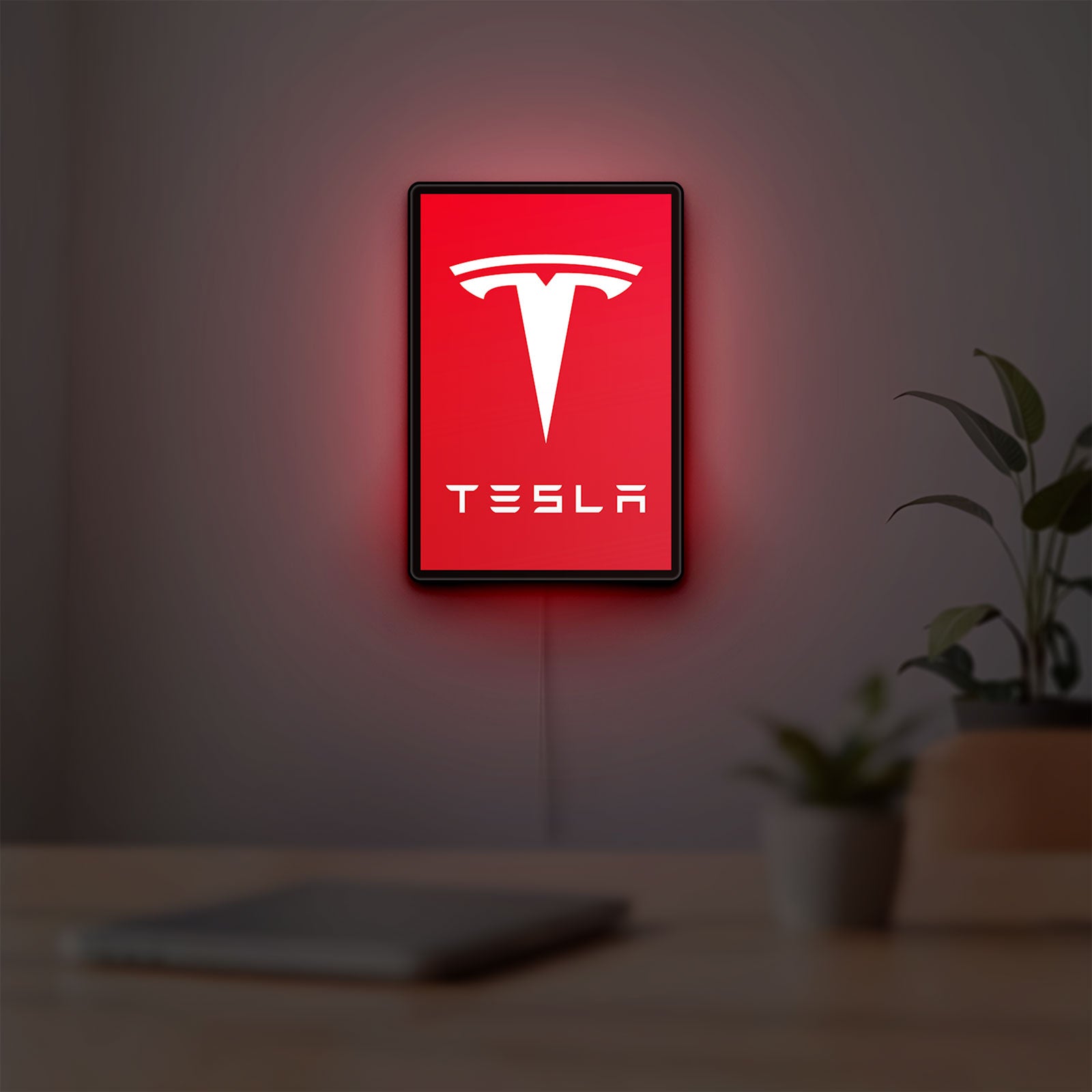 Tesla LED lightbox hanging on a room wall with soft red light