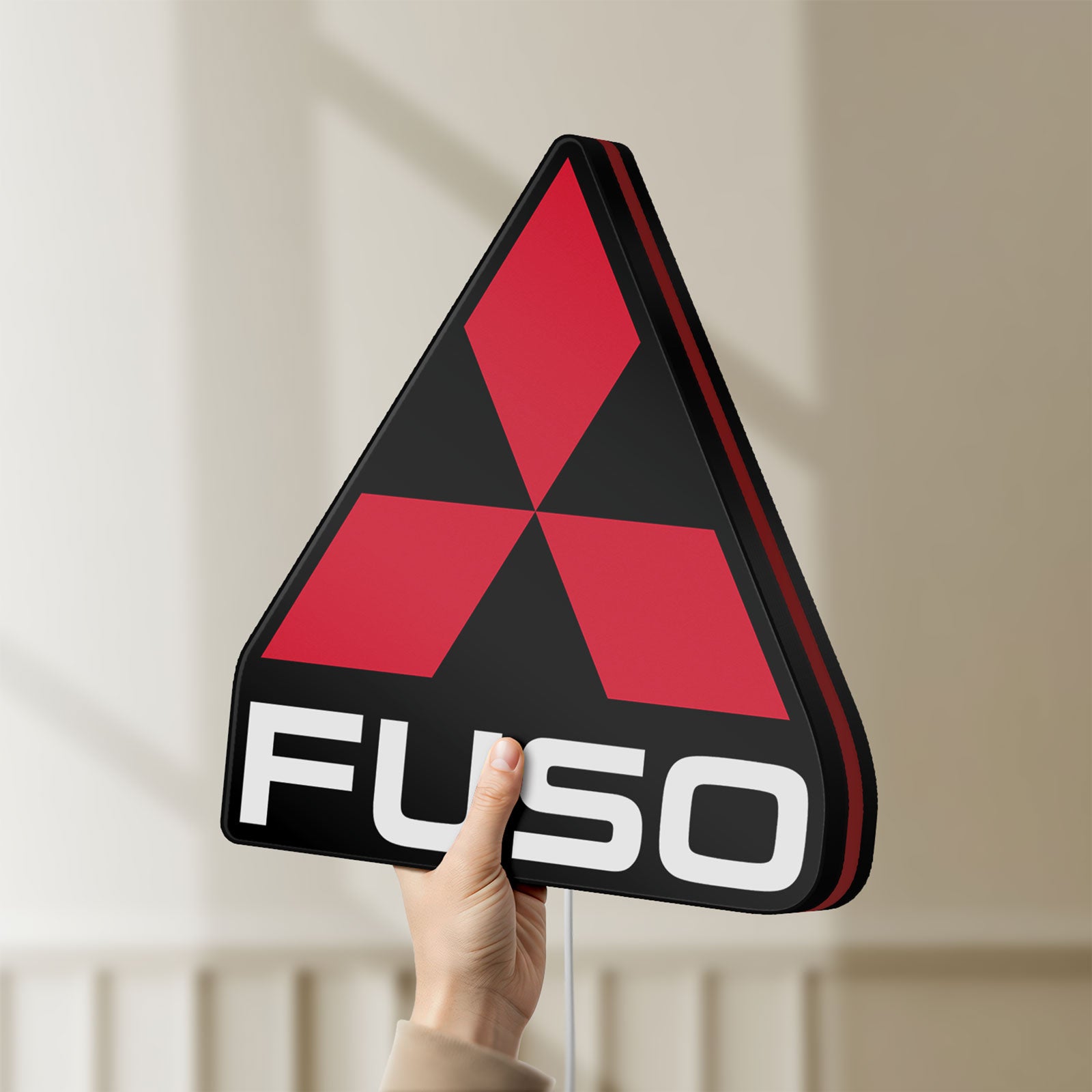 Unlit Fuso Truck LED lightbox held by hand to show size and details