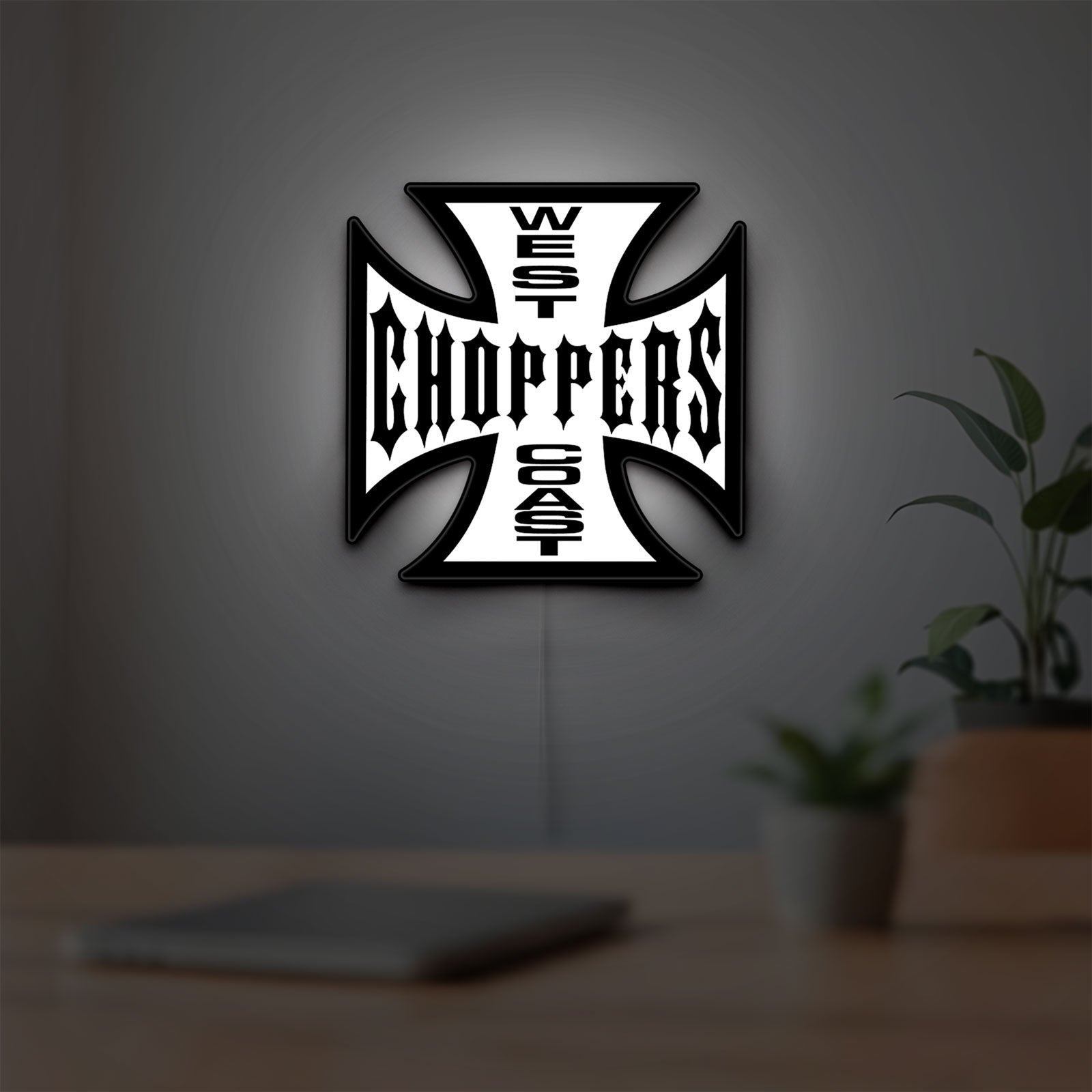 West Coast Choppers LED lightbox hanging on a room wall with soft white light