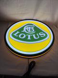 Illuminated flat lay angled view of Lotus Cars 3D LED Sign in 50cm, perfect for garage and man cave decor