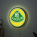 Lotus Cars LED lightbox hanging on a wall with yellow glow
