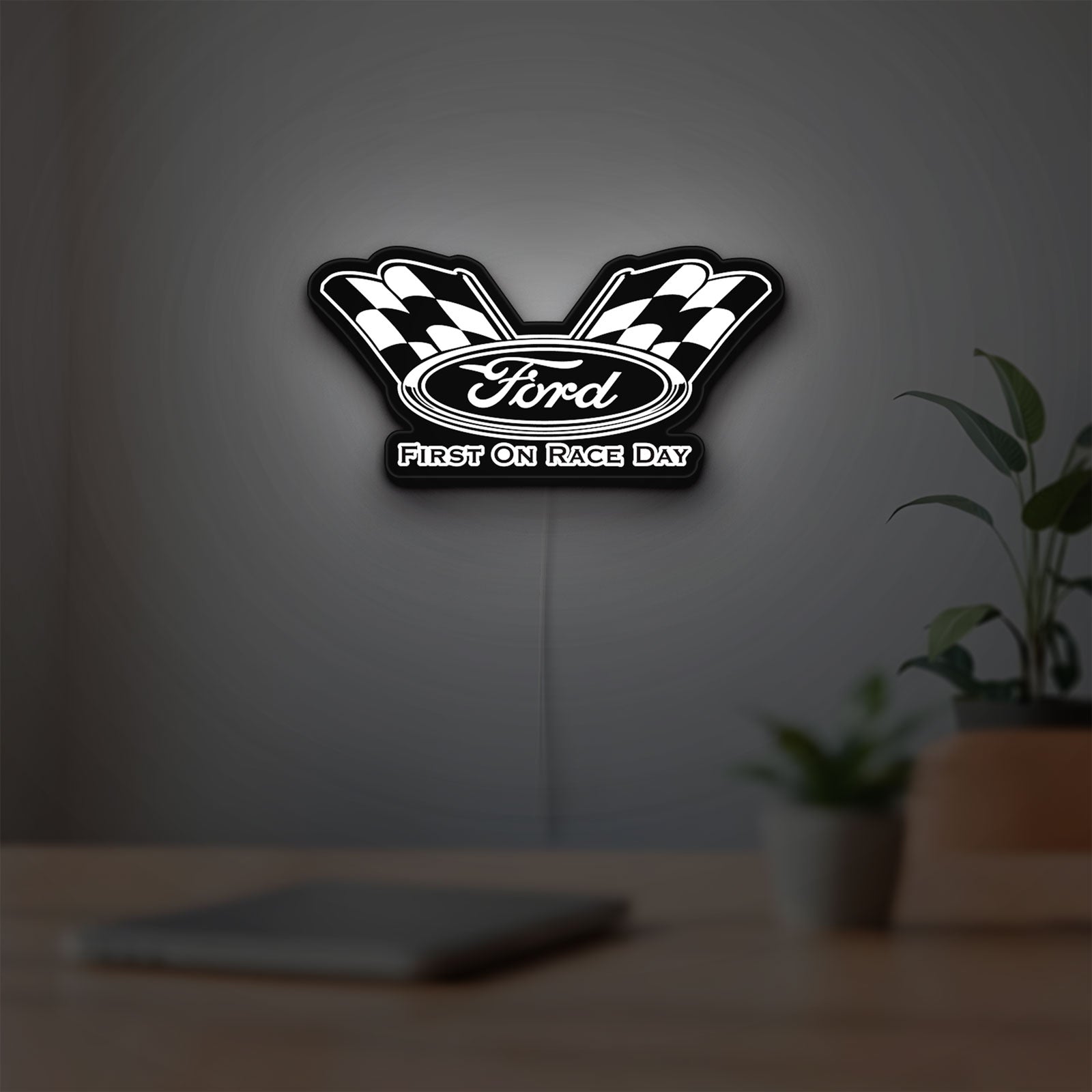 Ford Racing LED lightbox hanging on a room wall with soft white light