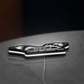 Ford Racing LED lightbox lying flat on a desk with white glow