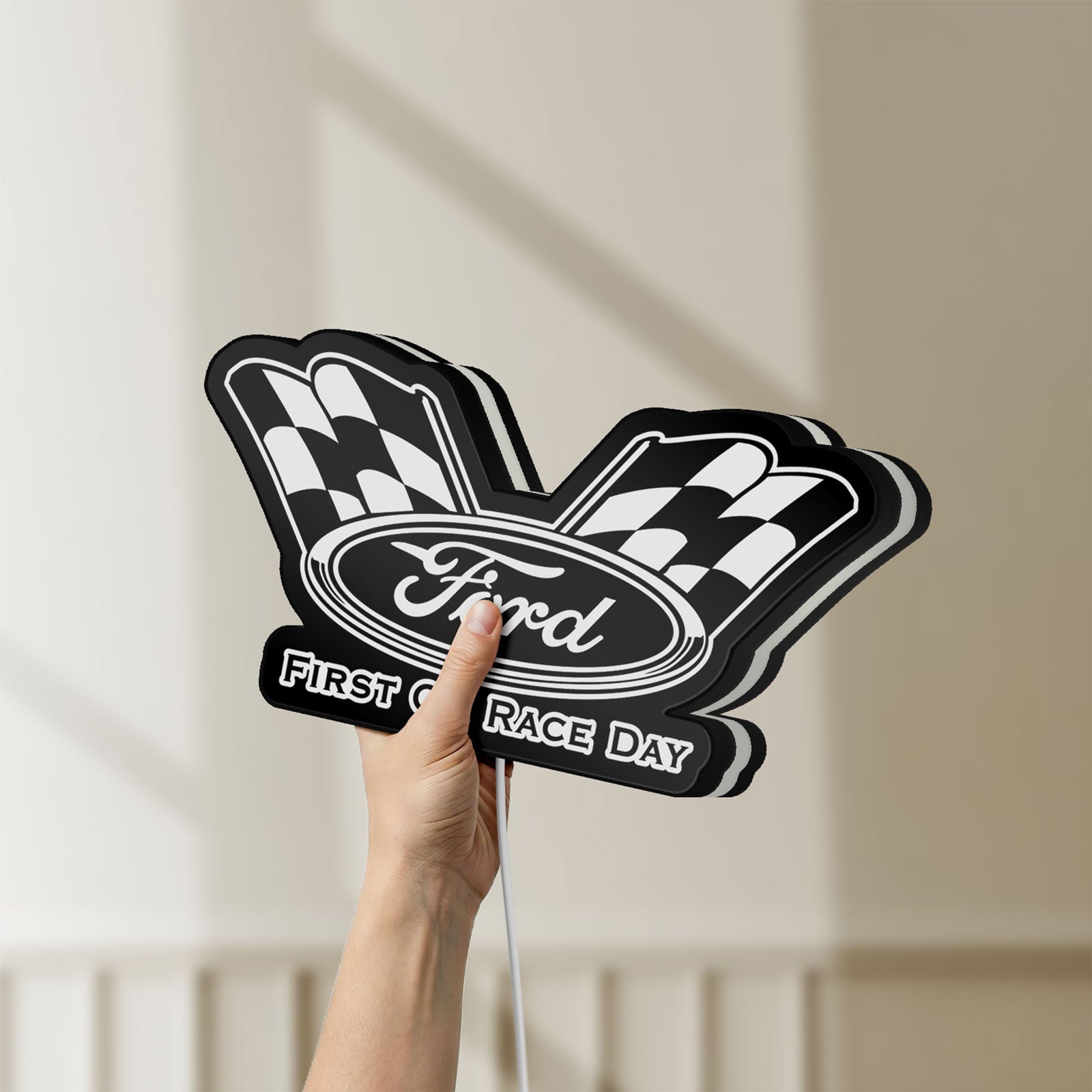 Unlit Ford Racing LED lightbox held by hand to show size and details