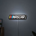 NASCAR LED lightbox hanging on a wall with white glow