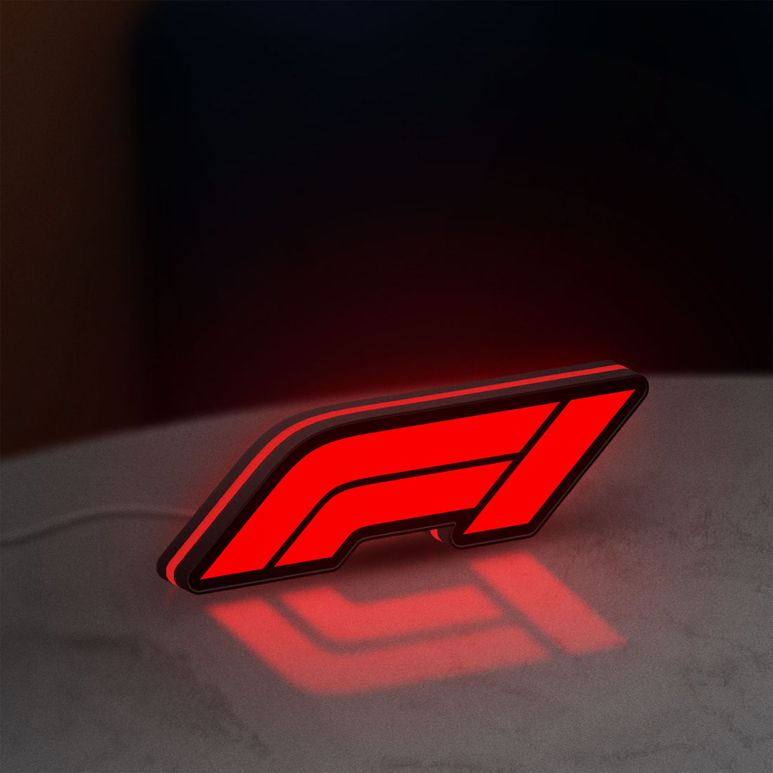 F1 2021 LED lightbox hanging on a wall with red glow