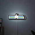 DEUTZ FAHR LED lightbox hanging on a wall with white glow