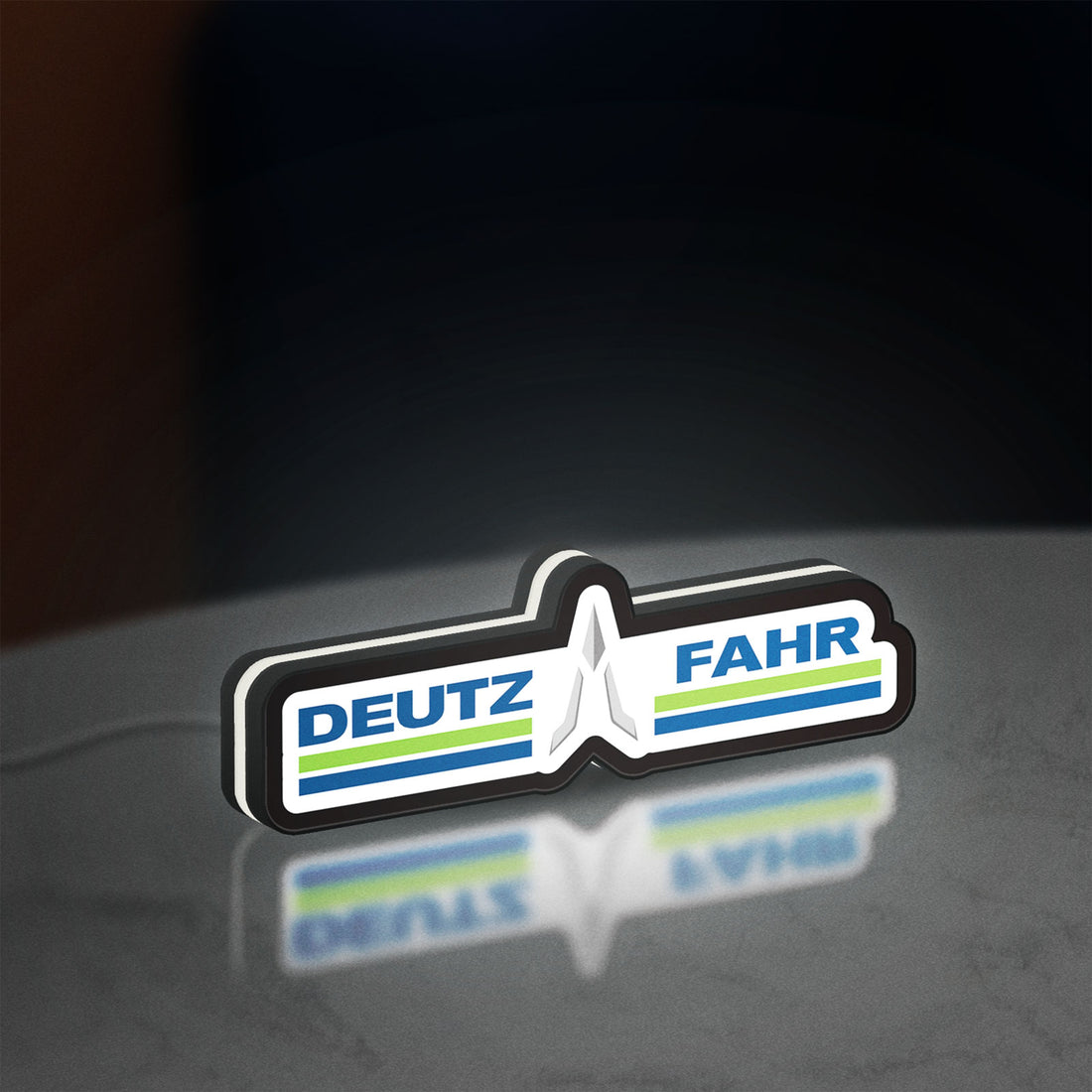 DEUTZ FAHR LED lightbox hanging on a wall with white glow