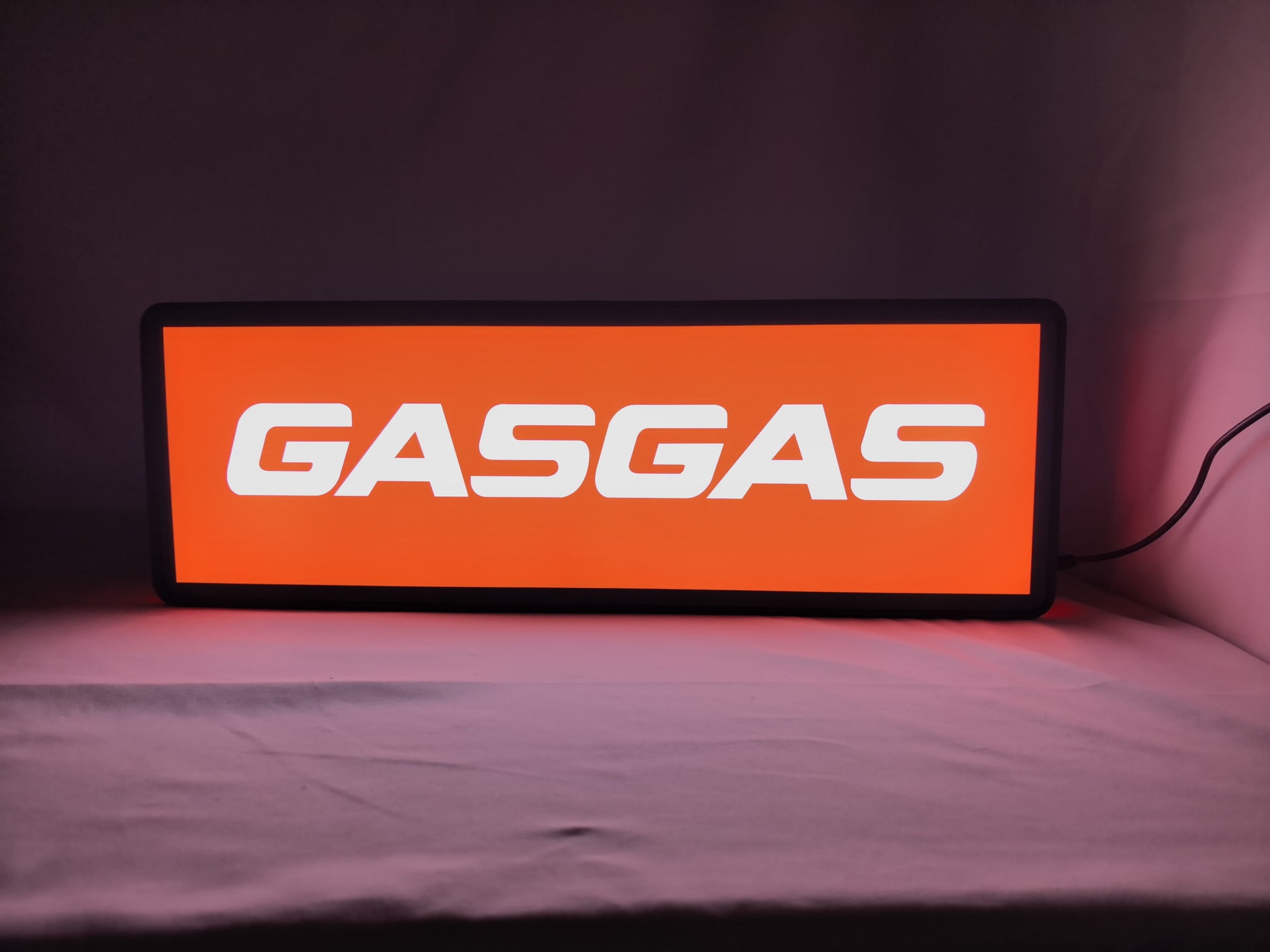 Gasgas LED Sign (50cm) - Illuminated front view standing, unique wall art for desk and room decor