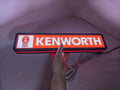 Illuminated handheld size reference of Kenworth 3D LED Sign in 40cm, perfect for garage and man cave decor