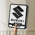 Unlit Suzuki LED lightbox held by hand to show size and details