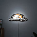 Screamin Eagle LED lightbox hanging on a wall with white glow