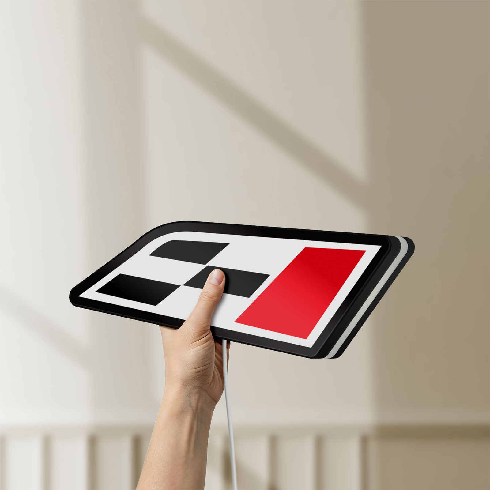 Unlit Cupra Racing Flag LED lightbox held by hand to show size and details
