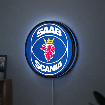 SAAB Scania LED lightbox hanging on a wall with blue glow