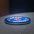 SAAB Scania LED lightbox lying flat on a desk with blue glow
