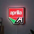 Aprilia LED lightbox hanging on a wall with red glow
