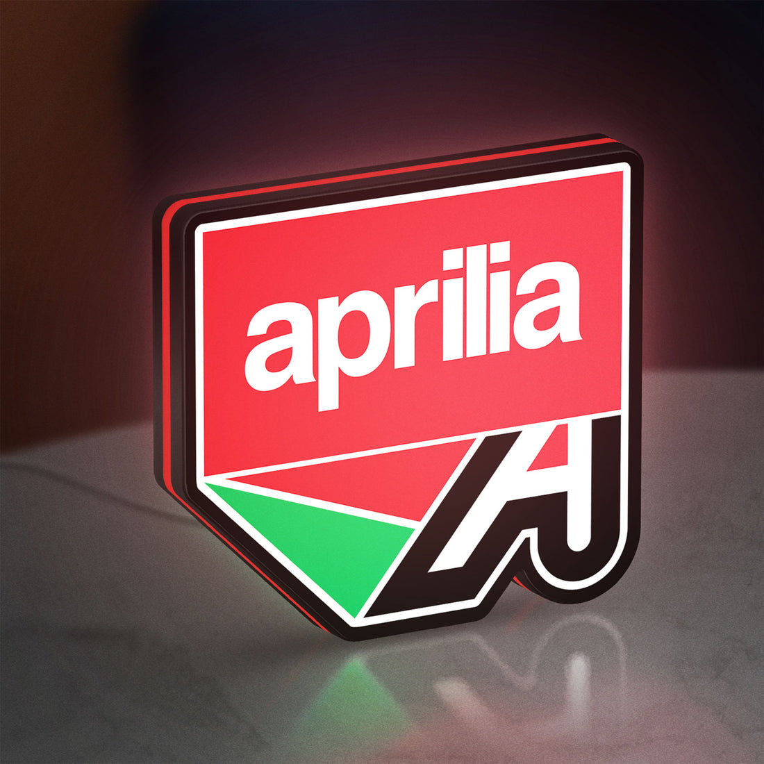 Aprilia LED lightbox hanging on a wall with red glow