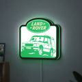 Land Rover Discovery LED lightbox hanging on a wall with green glow