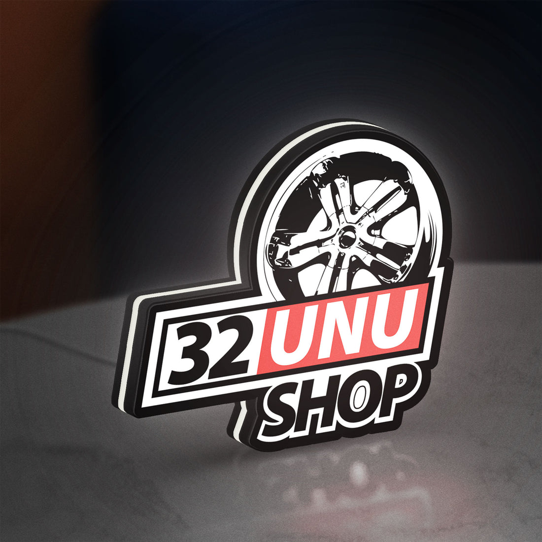 32UNU SHOP LED lightbox hanging on a wall with white glow
