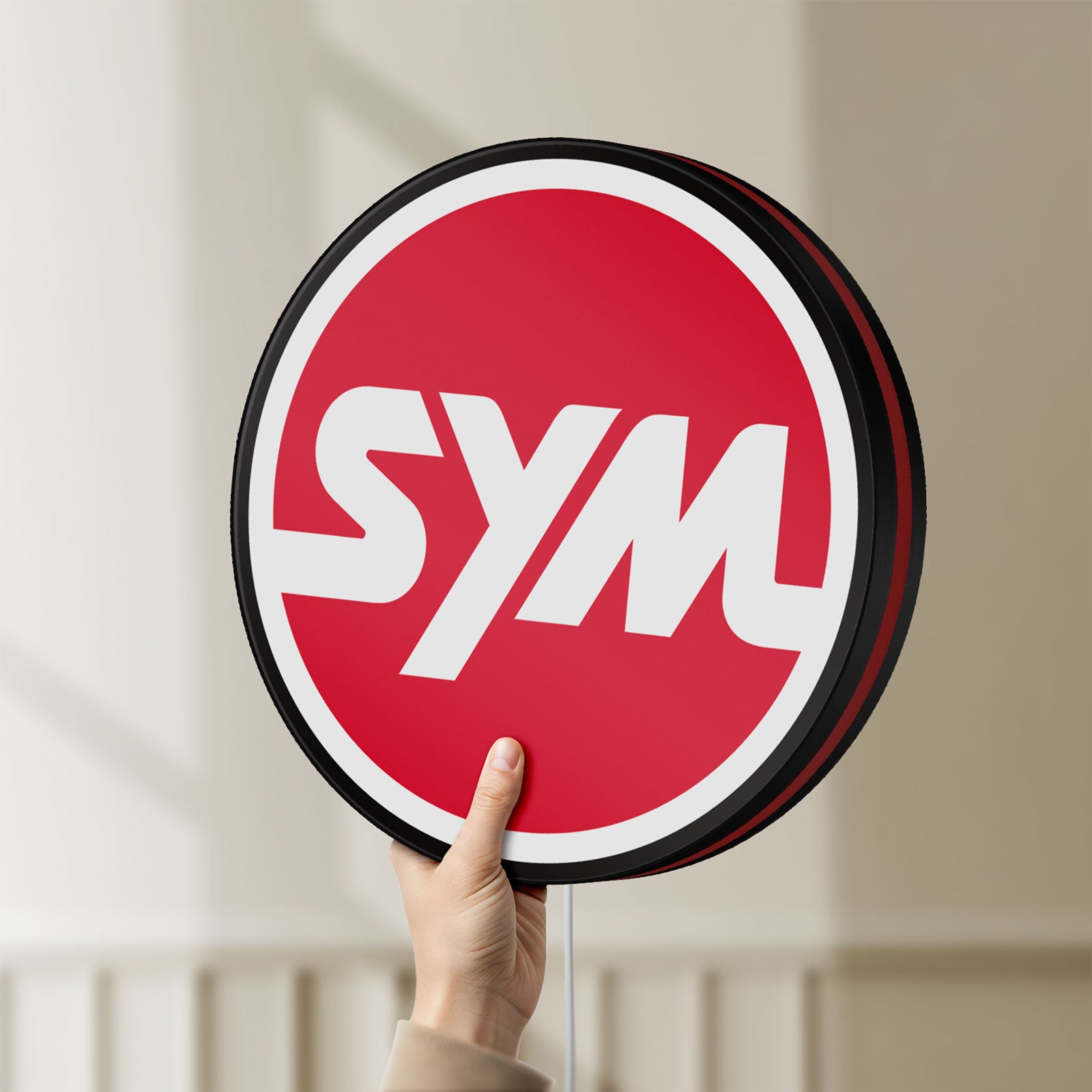 Unlit SYM Sanyang Scooters Motorcycle LED lightbox held by hand to show size and details
