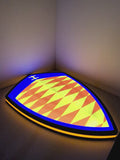 Illuminated flat lay angled view of Koenigsegg Illuminated Sign in 60cm, perfect for garage and man cave decor