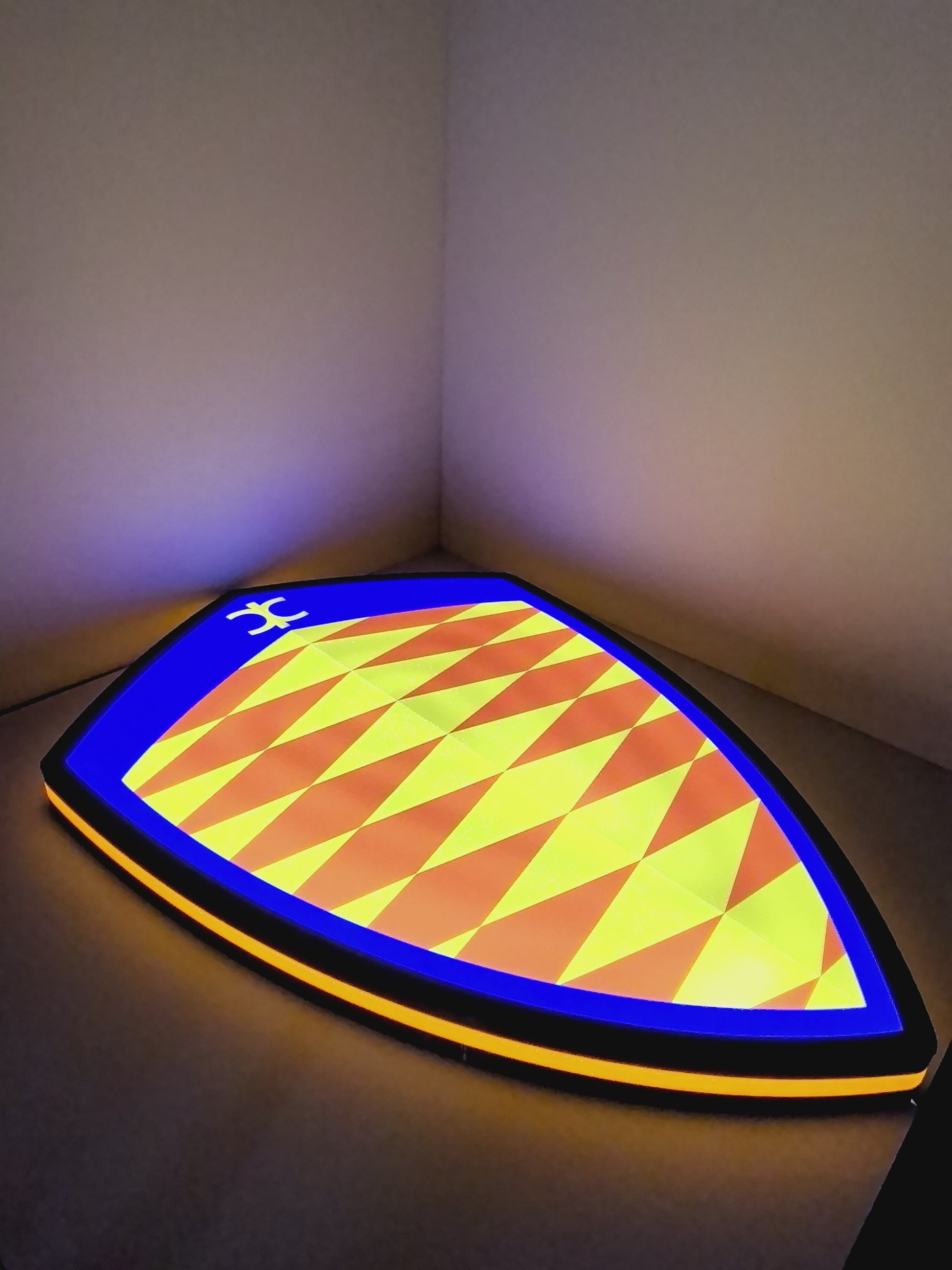 Illuminated flat lay angled view of Koenigsegg Illuminated Sign in 60cm, perfect for garage and man cave decor