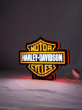 Illuminated angled view standing of Harley Davidson Illuminated Sign in 20cm, unique wall art for desk and room decor