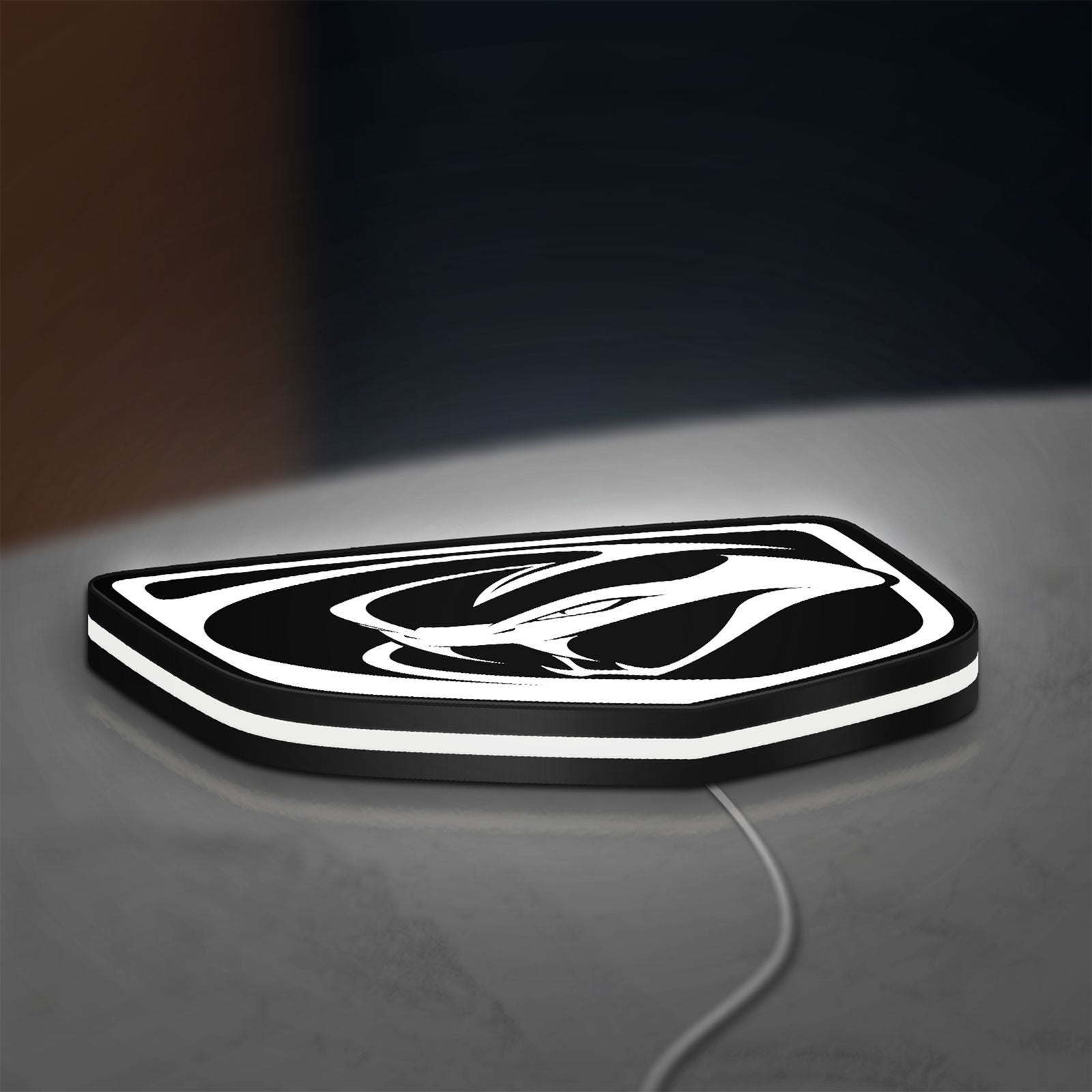 Dodge Viper LED lightbox lying flat on a desk with white glow