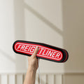 Unlit Freightliner Trucks LED lightbox held by hand to show size and details