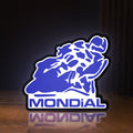 Front view of Mondial Motorcycle LED lightbox sign glowing on a wooden desk