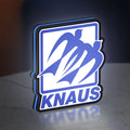 Knaus LED lightbox standing on a desk from an angled side view with blue glow