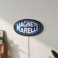 Unlit Magneti Marelli LED lightbox mounted on a wall in daylight